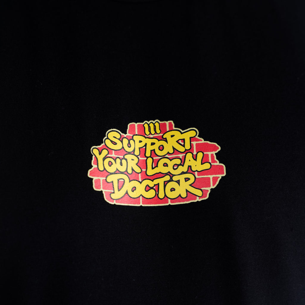 Regata Cut Off Mith Comam Frutas Support Your Local Doctor Preto